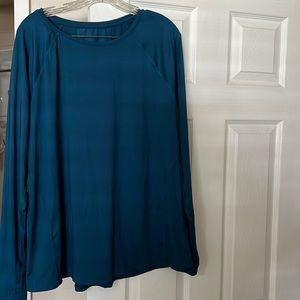 Work out shirts one teal, one green, one tags, one no tags, never worn